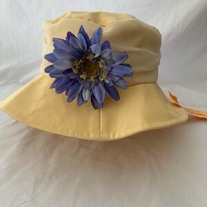Hat, fabric, bucket style, yellow with bluish flower.